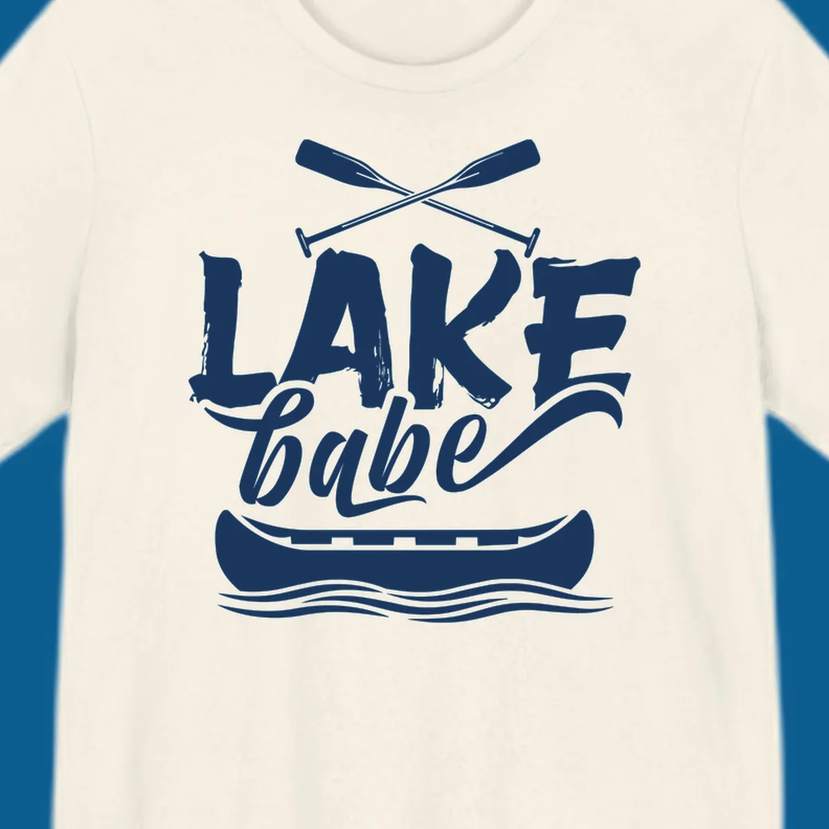Lake babe text with canoe and oars on water. Primary keyword: lake-babe-canoe