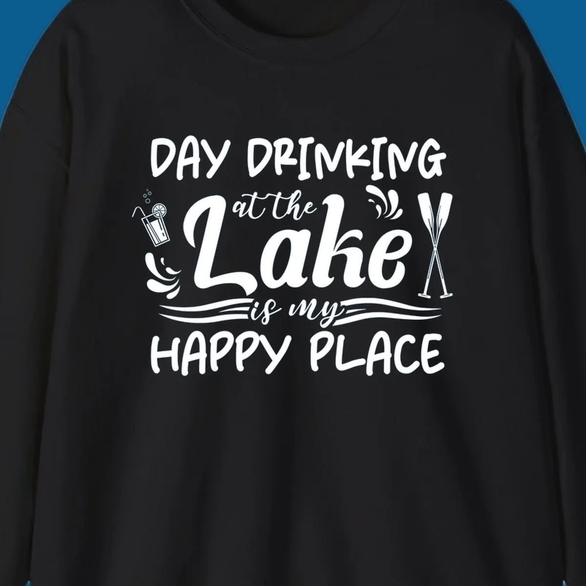 Typography design 'Day Drinking at the Lake is My Happy Place' with lake-themed illustrations.