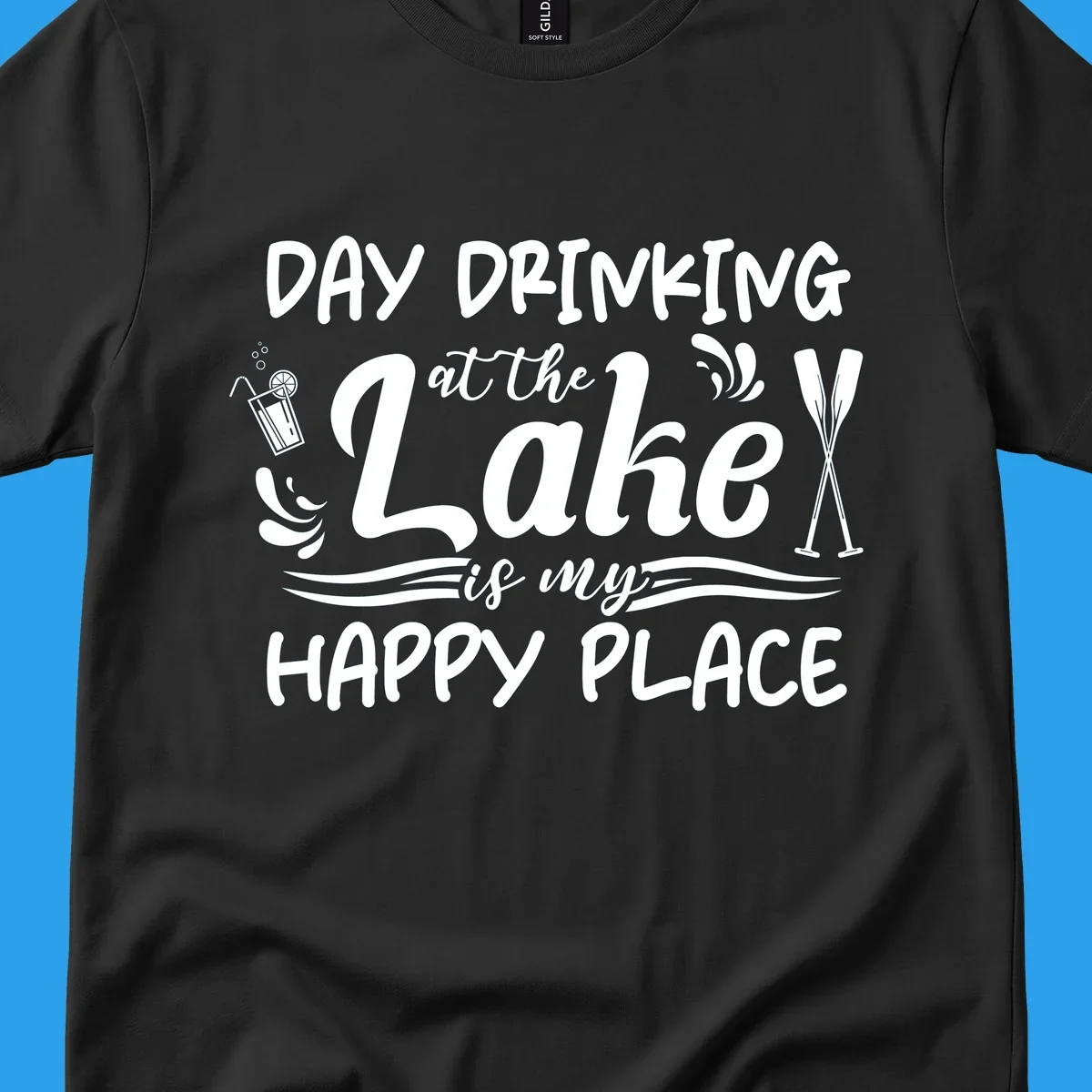 Typography design 'Day Drinking at the Lake is My Happy Place' with lake-themed illustrations.