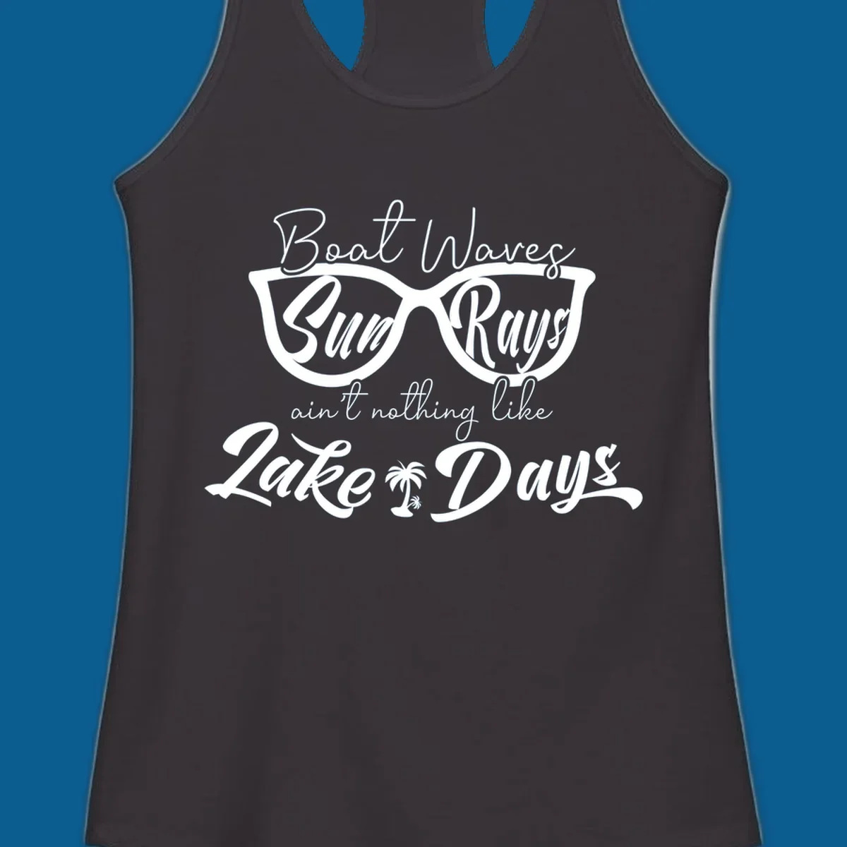 Boat Waves Sun Rays ain't nothing like Lake Days design with sunglasses and palm tree.