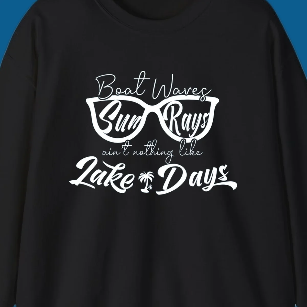 Boat Waves Sun Rays ain't nothing like Lake Days design with sunglasses and palm tree.