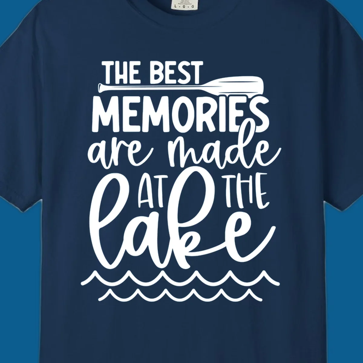 The best memories are made at the lake typography with paddle and waves.