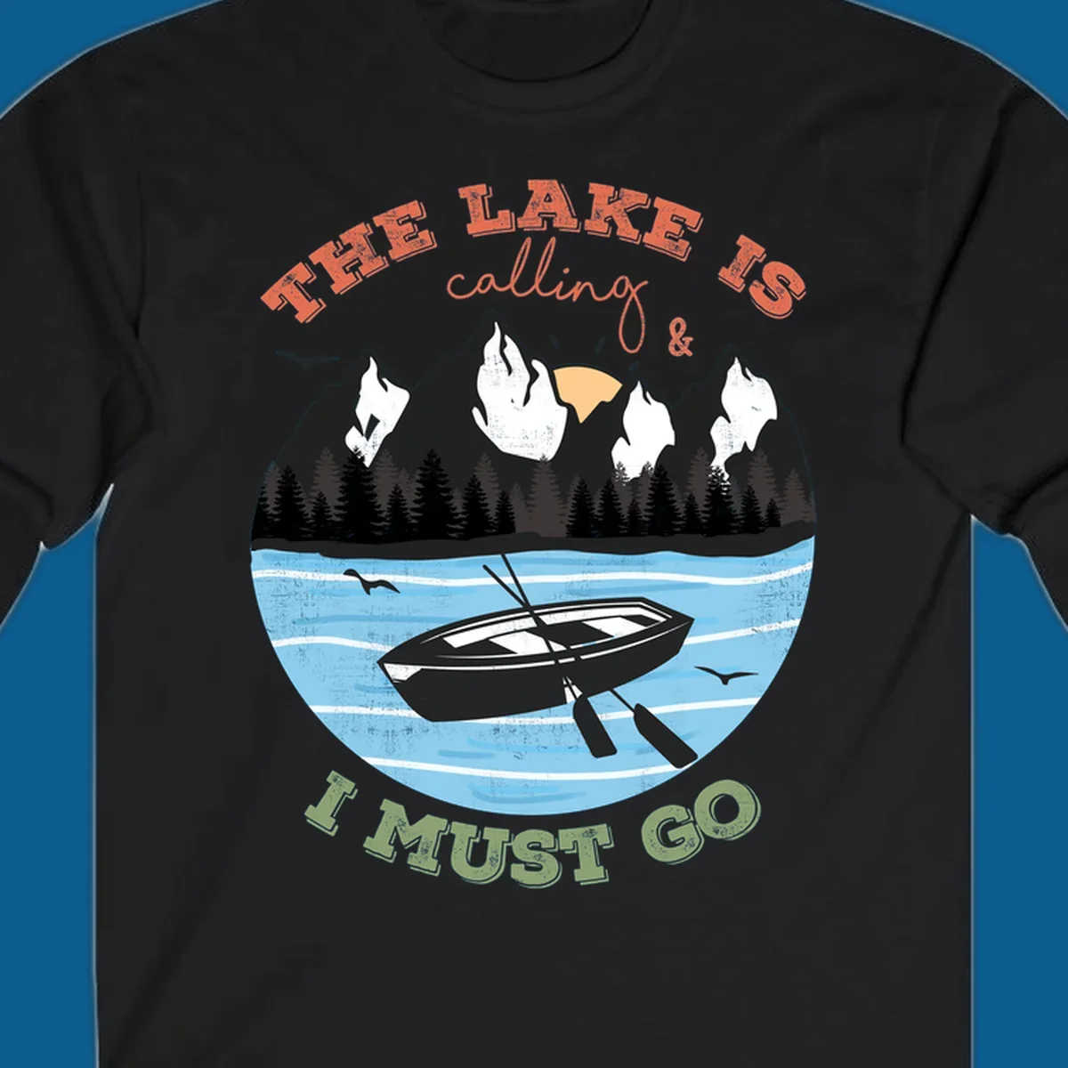 The lake is calling and I must go mountain lake scene with rowboat graphic