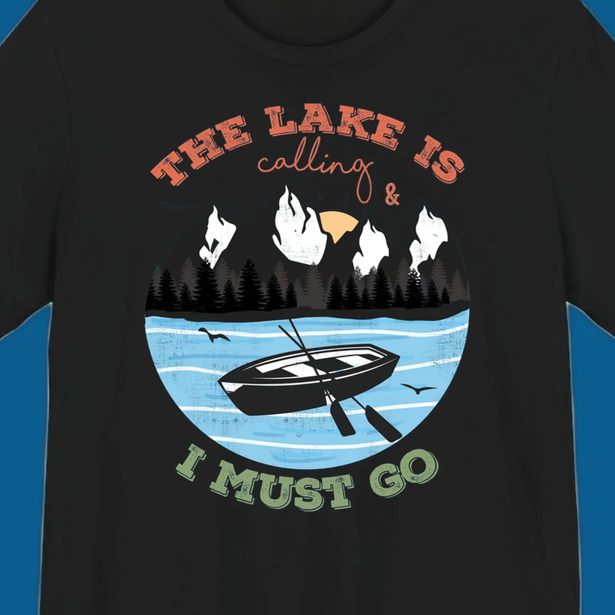 The lake is calling and I must go mountain lake scene with rowboat graphic