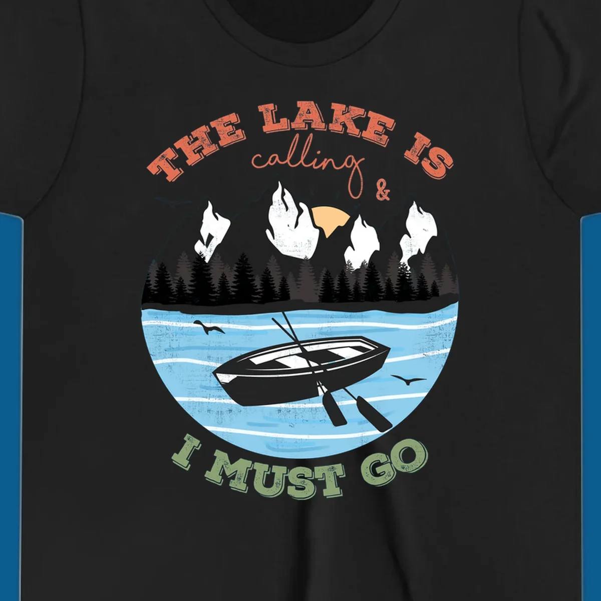 The lake is calling and I must go mountain lake scene with rowboat graphic
