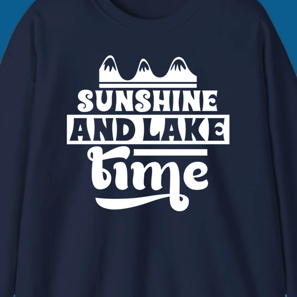 Sunshine and lake time graphic with mountains, white and navy.