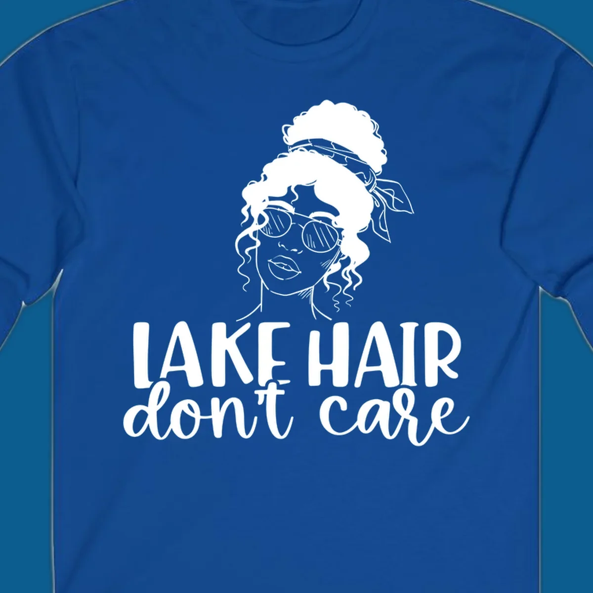 Illustration of a woman with sunglasses and messy bun, with text 'Lake Hair Don't Care'.
