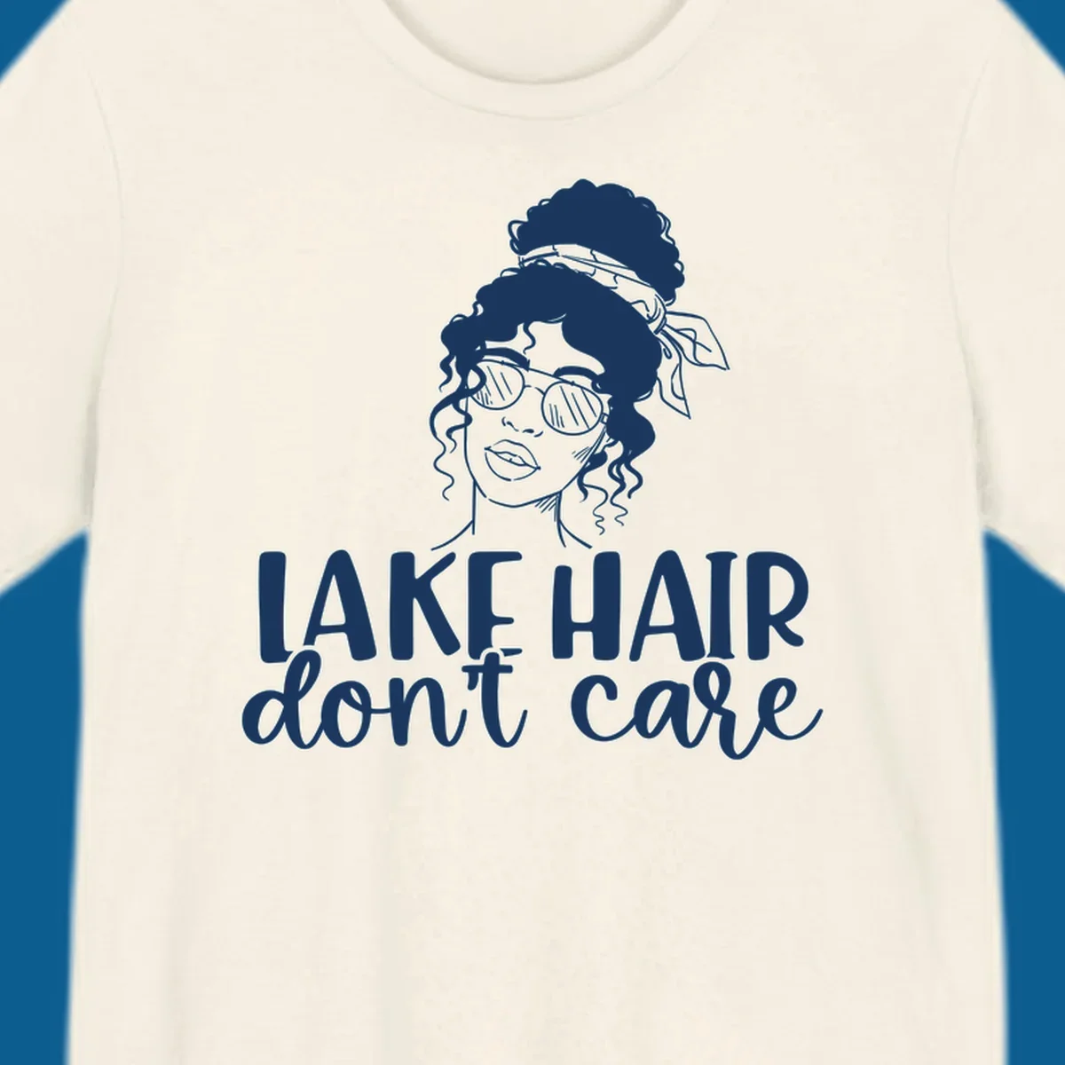 Illustration of a woman with sunglasses and messy bun, with text 'Lake Hair Don't Care'.