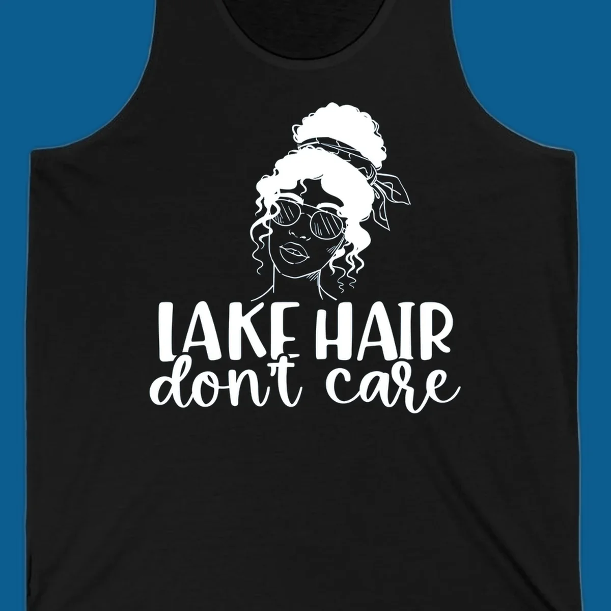 Illustration of a woman with sunglasses and messy bun, with text 'Lake Hair Don't Care'.