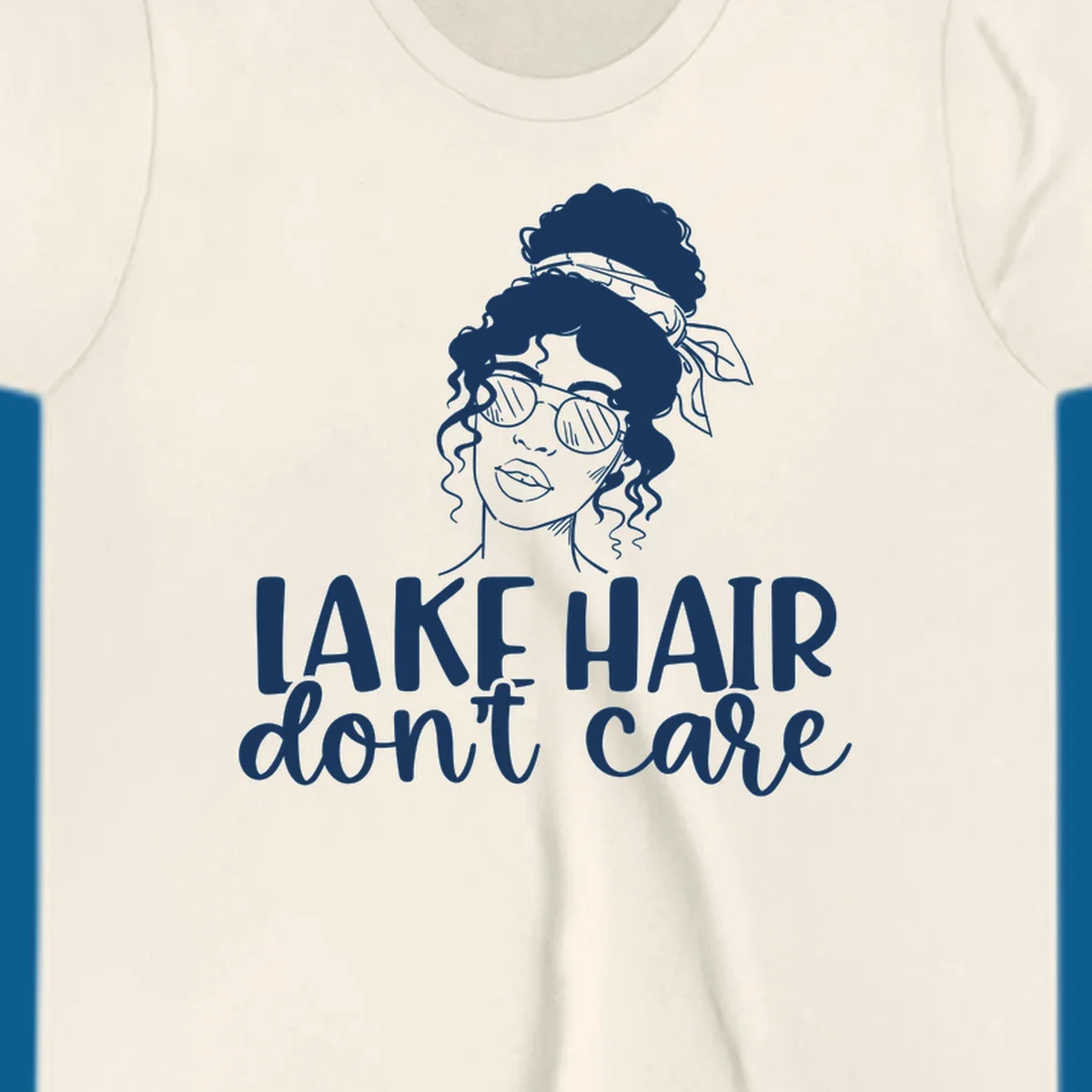 Illustration of a woman with sunglasses and messy bun, with text 'Lake Hair Don't Care'.