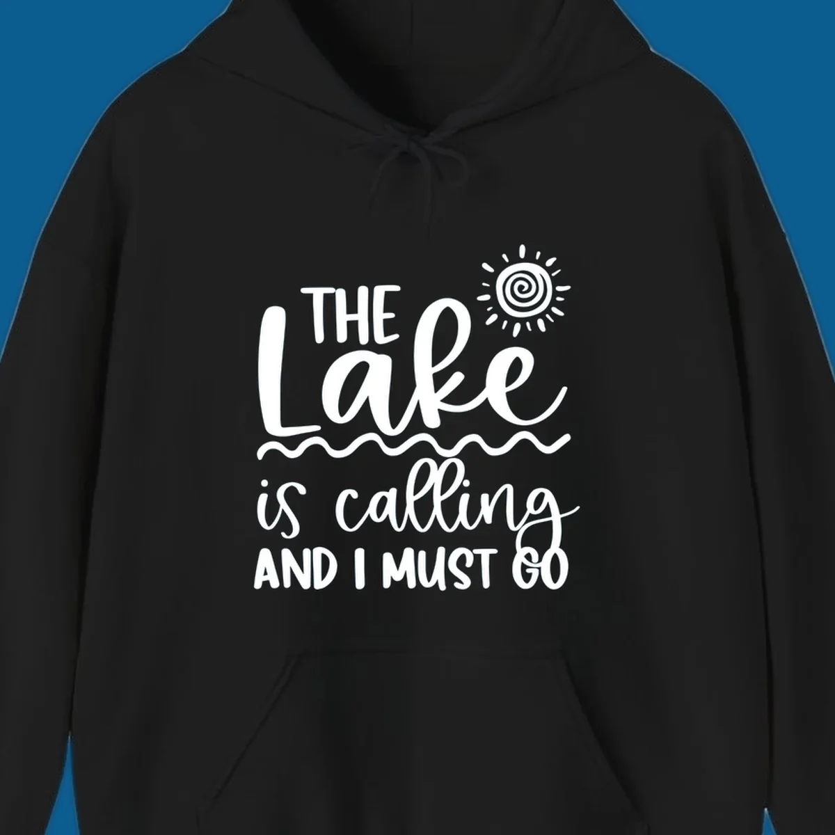 The lake is calling and I must go typography with sun and waves graphic
