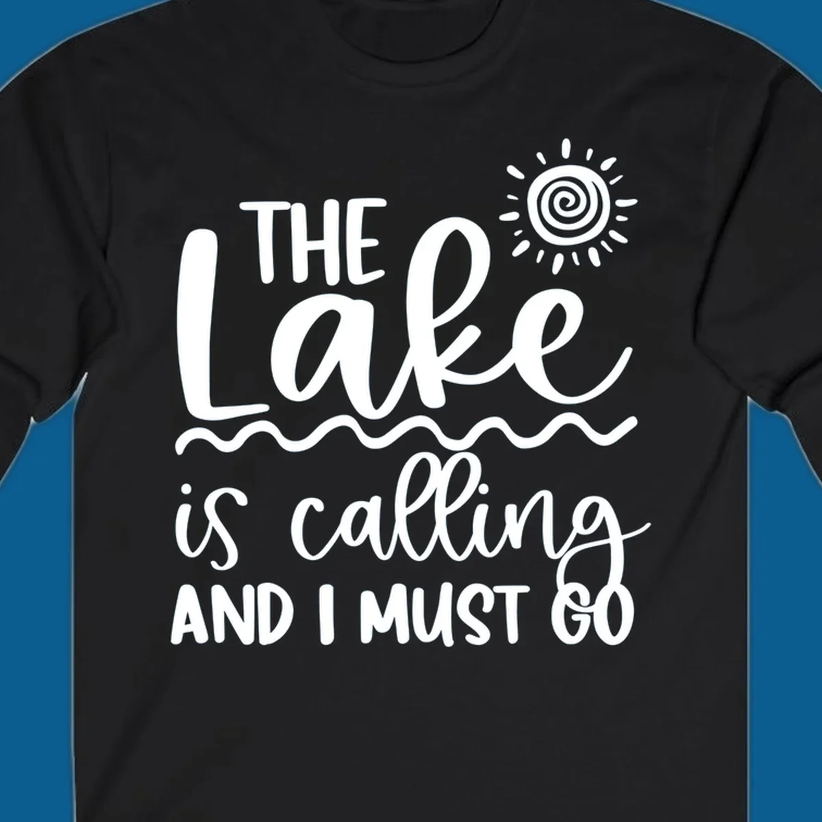 The lake is calling and I must go typography with sun and waves graphic