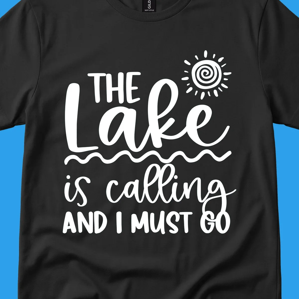 The lake is calling and I must go typography with sun and waves graphic
