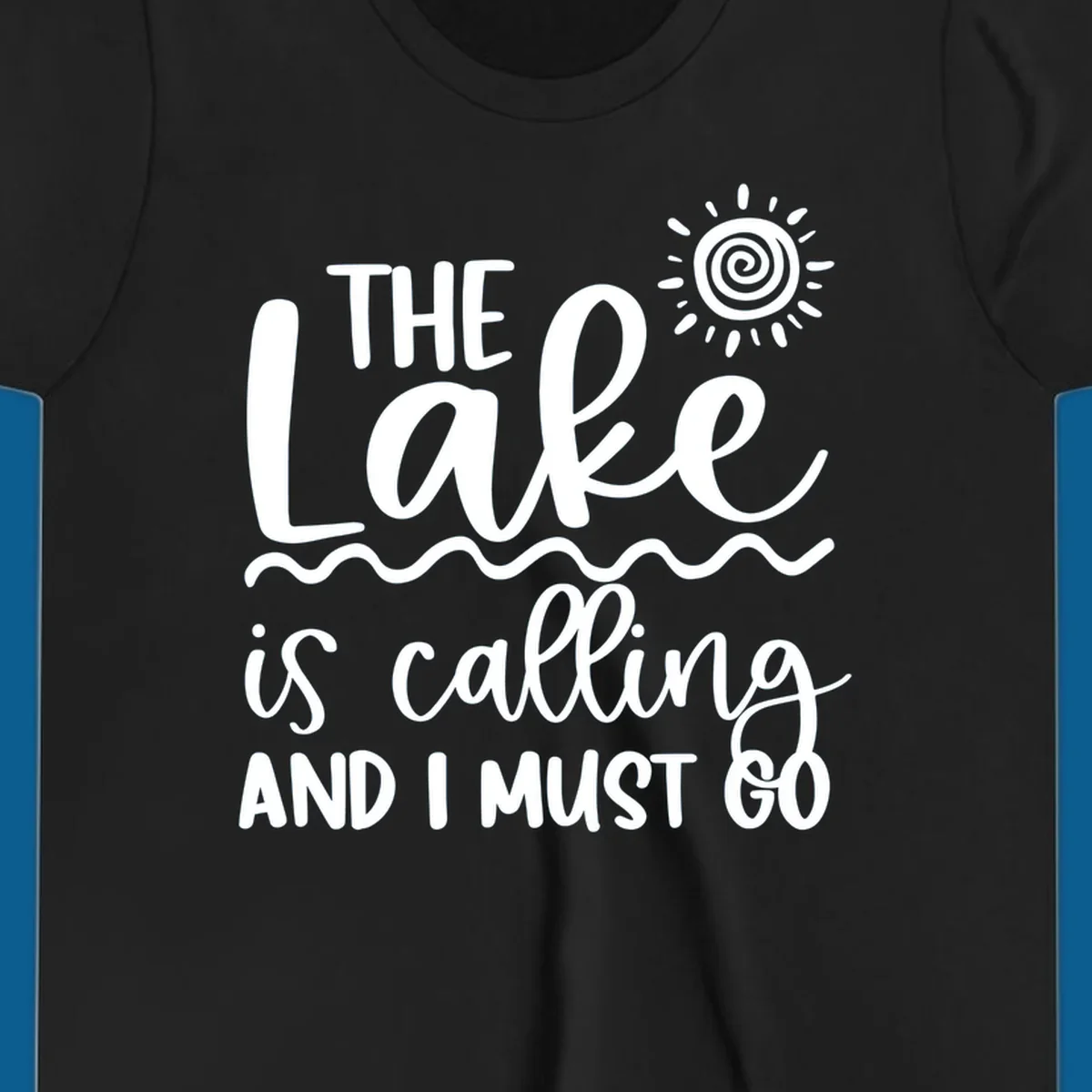 The lake is calling and I must go typography with sun and waves graphic