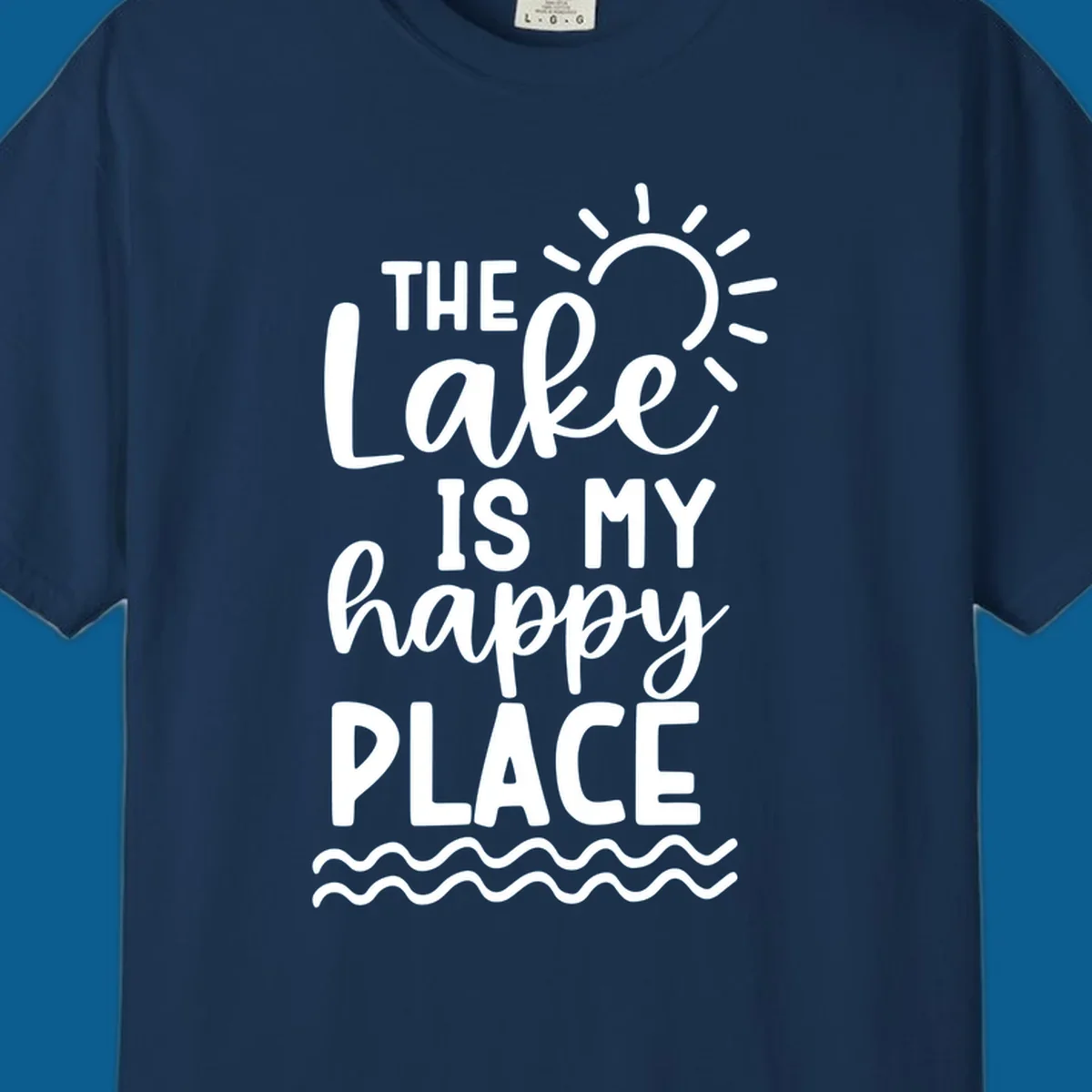 The Lake Is My Happy Place text design with sun and waves graphic.