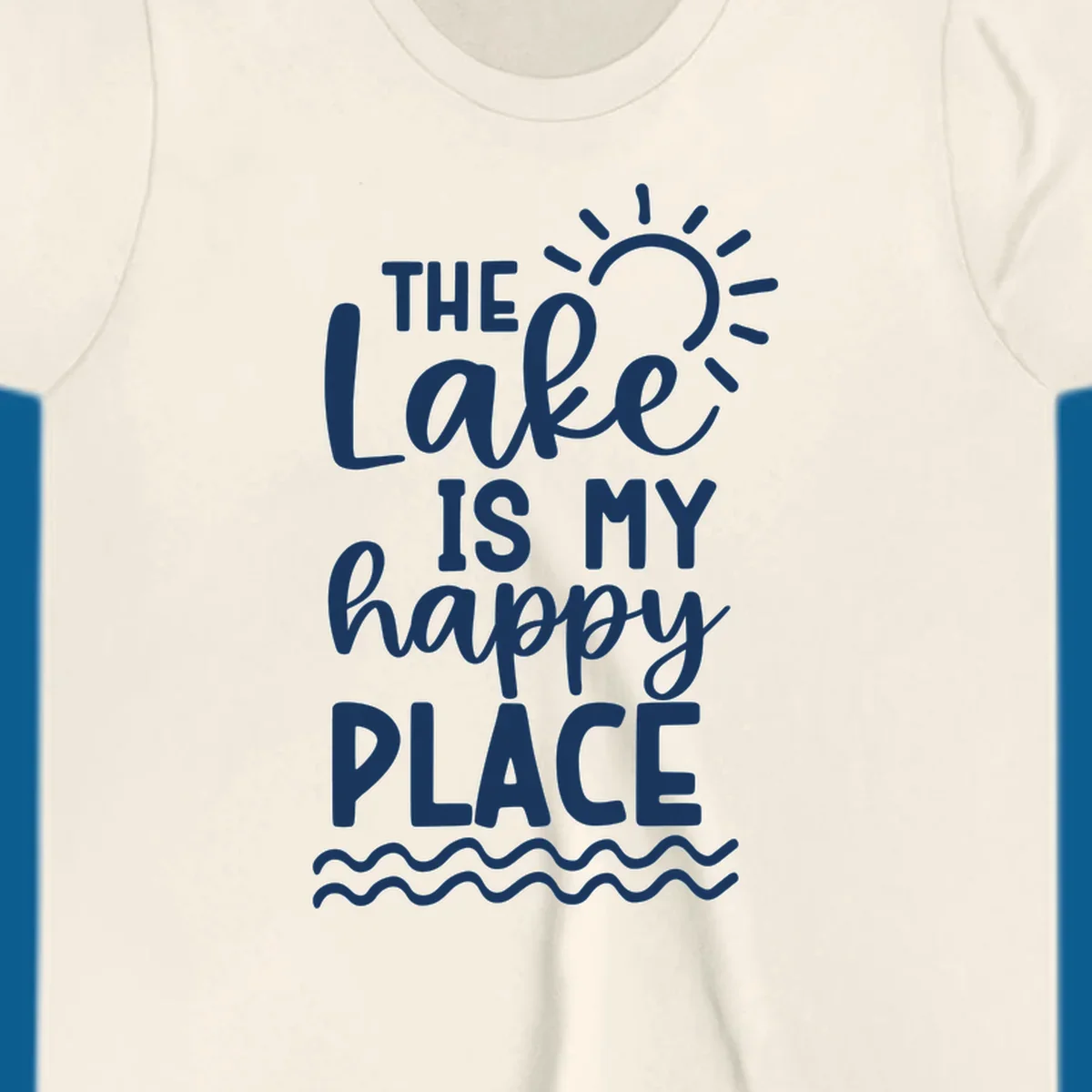 The Lake Is My Happy Place text design with sun and waves graphic.