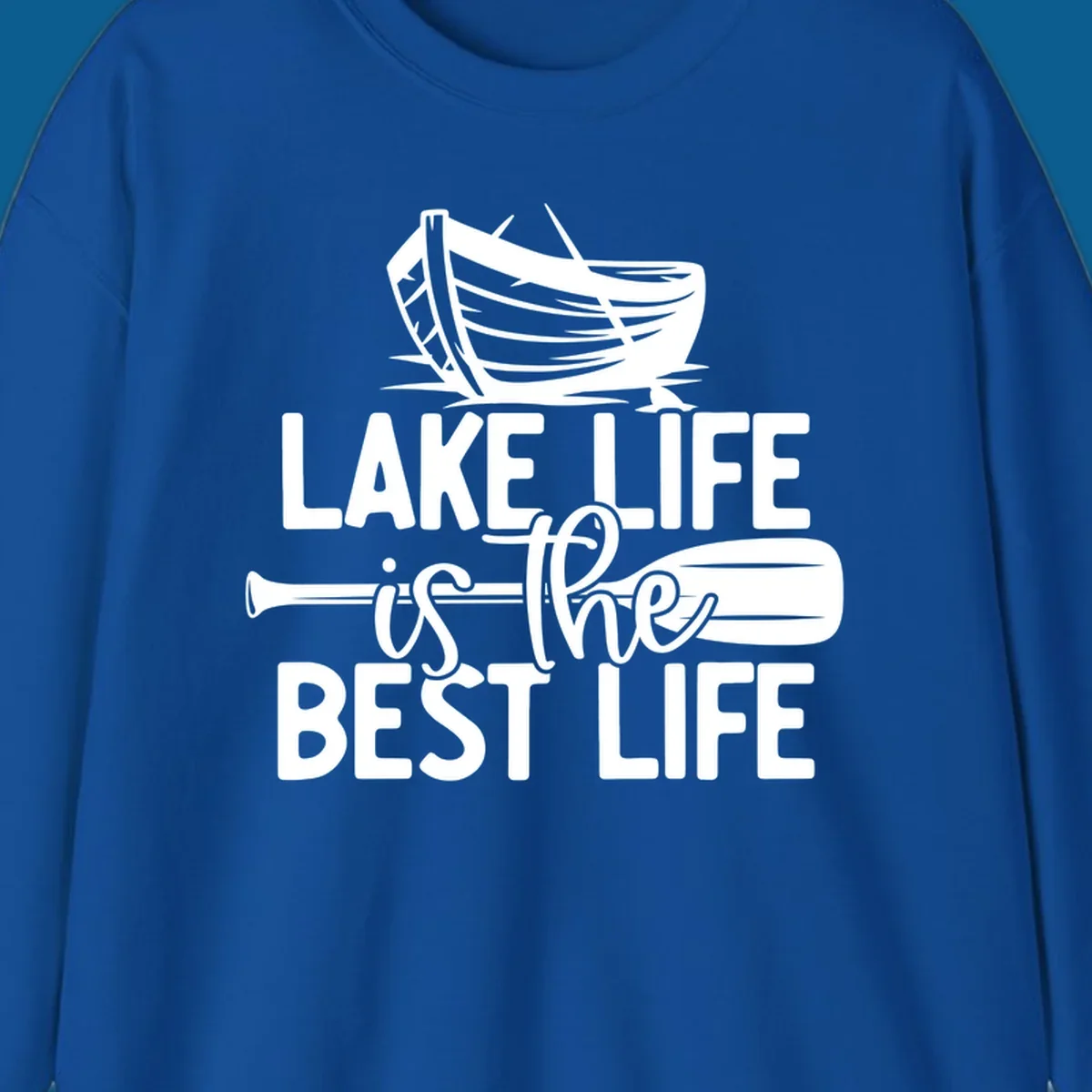 Lake life is the best life text and graphics featuring a rowboat and oar.