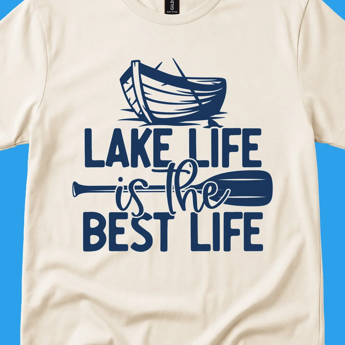 Lake life is the best life text and graphics featuring a rowboat and oar.