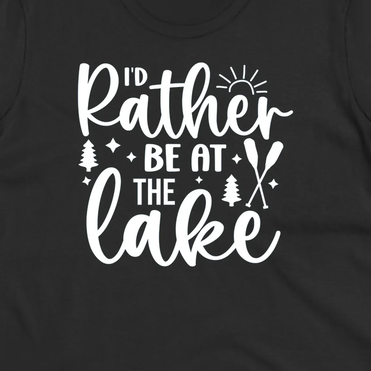 I'd Rather Be At The Lake typography design with sun rays, trees, and oars.