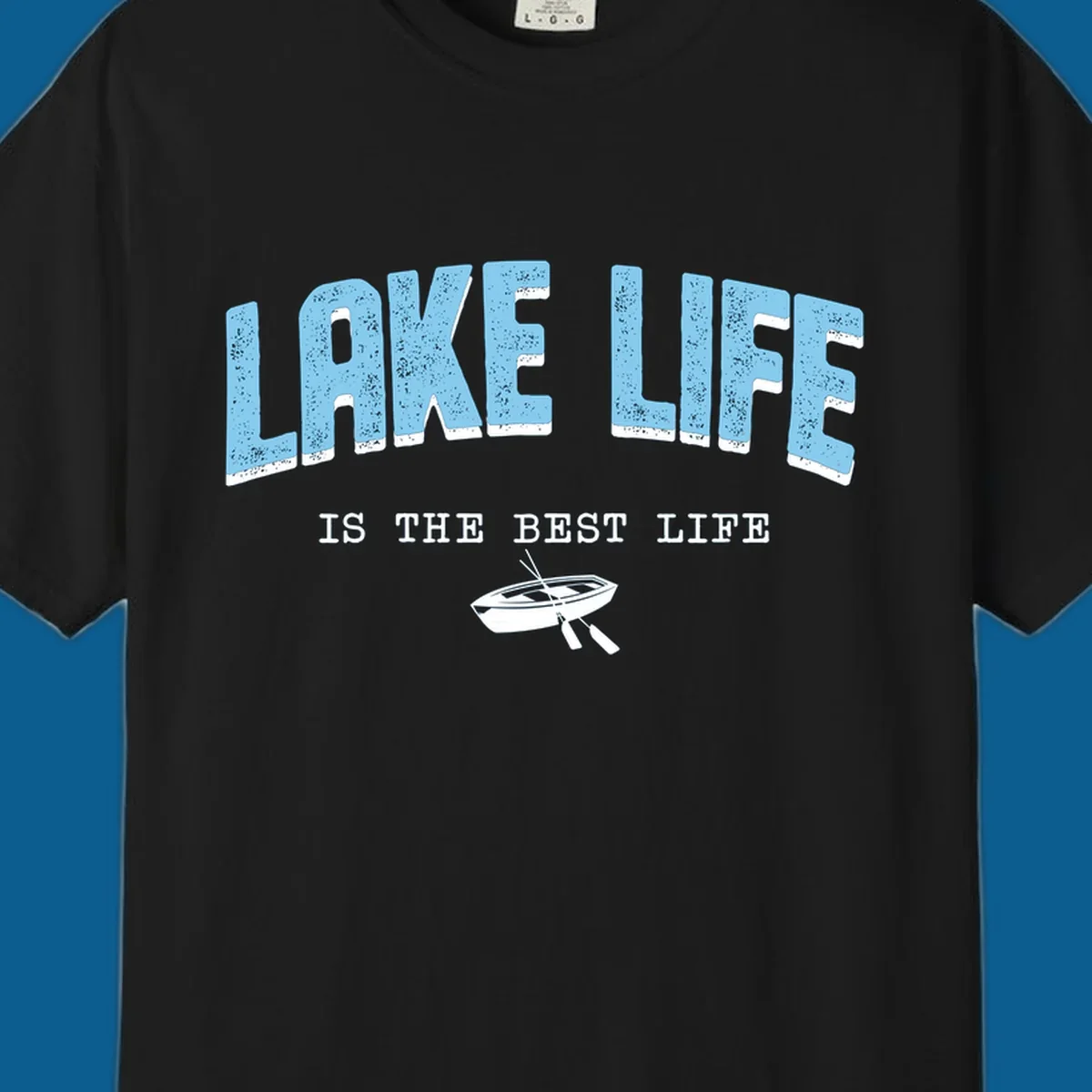 Lake life is the best life text with rowboat illustration