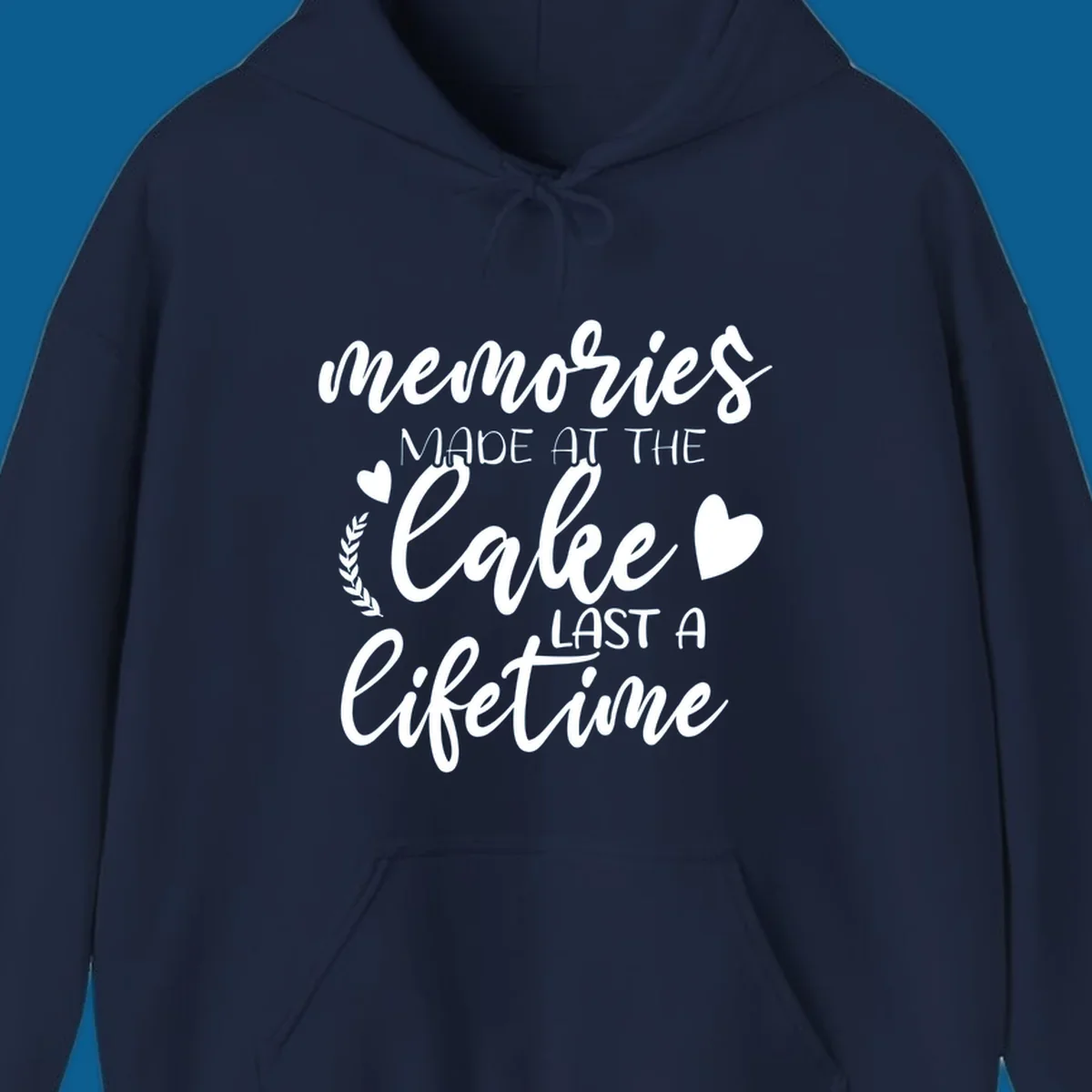Lake life memories text design with hearts and laurel wreath.