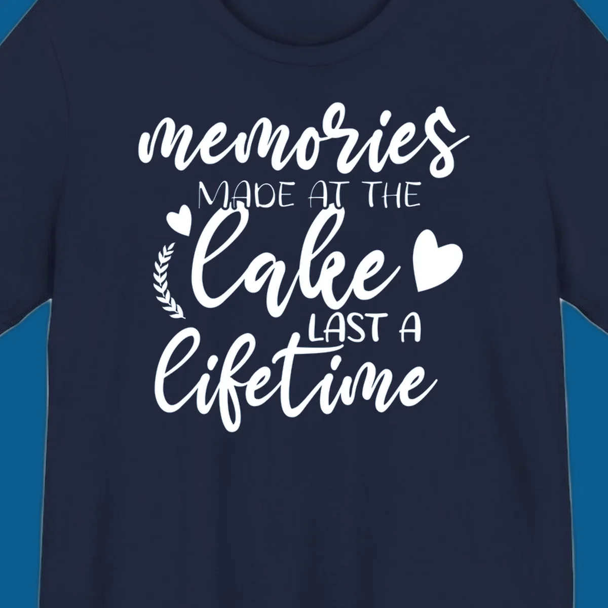Lake life memories text design with hearts and laurel wreath.