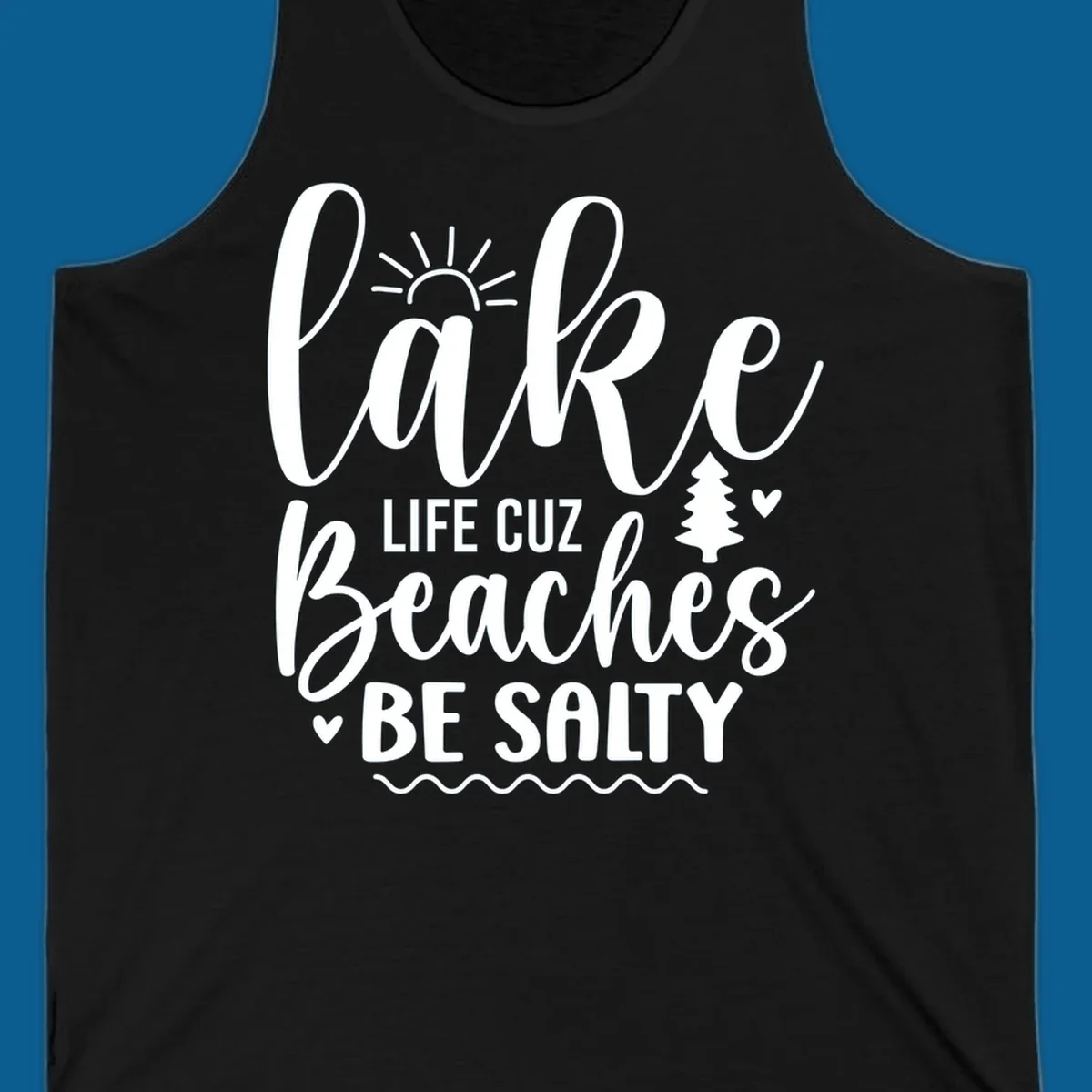 Lake life cuz beaches be salty text design with sun and tree elements.