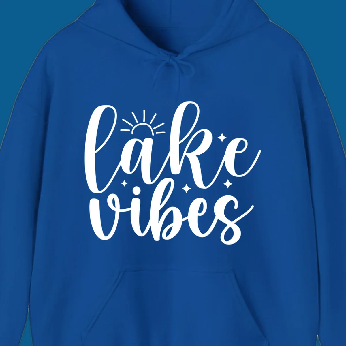 White script text that reads 'lake vibes' with sun and sparkle graphics, representing the lake-vibes-script concept.