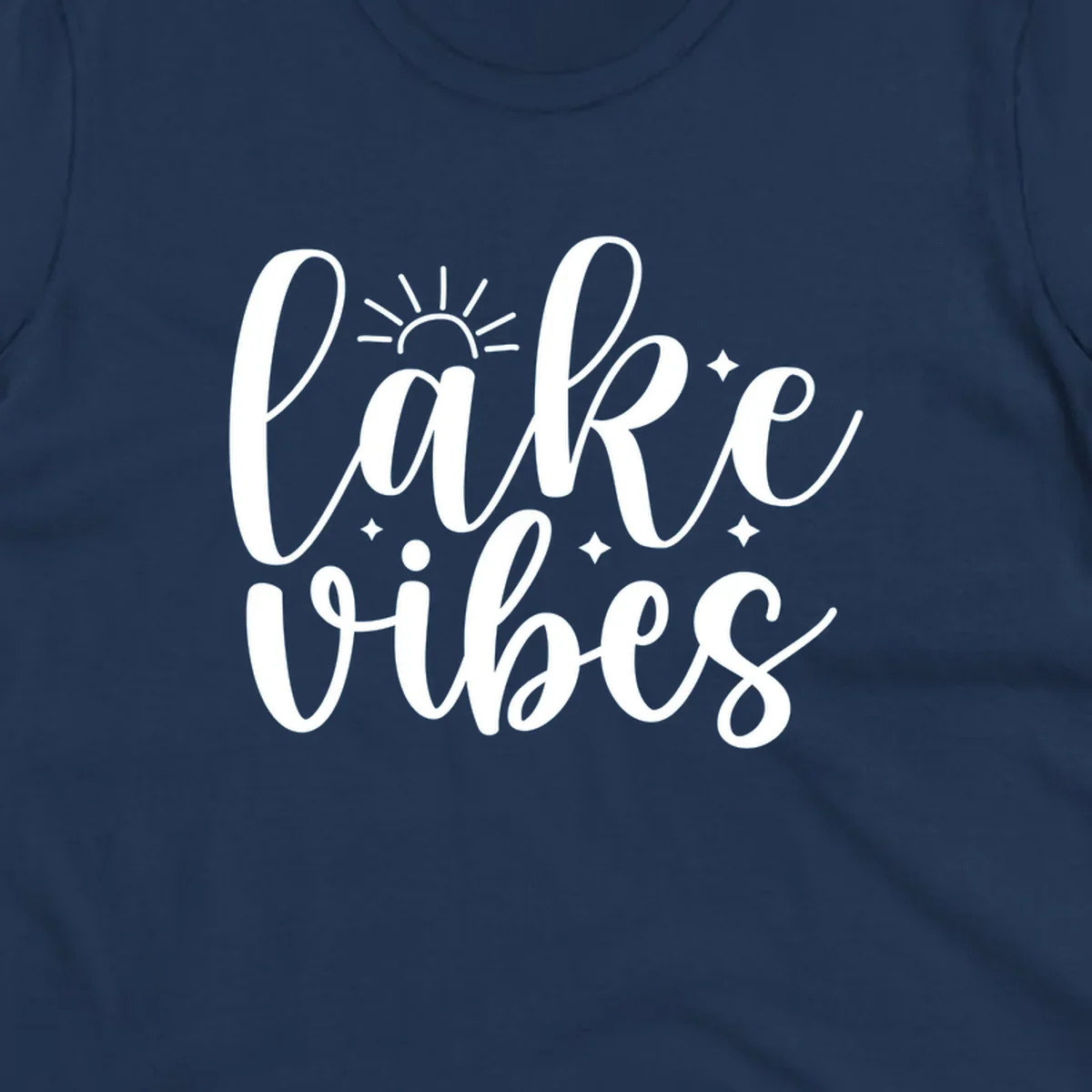 White script text that reads 'lake vibes' with sun and sparkle graphics, representing the lake-vibes-script concept.