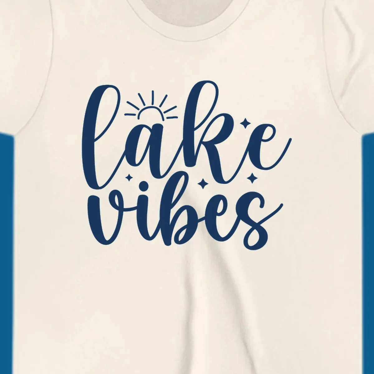 White script text that reads 'lake vibes' with sun and sparkle graphics, representing the lake-vibes-script concept.