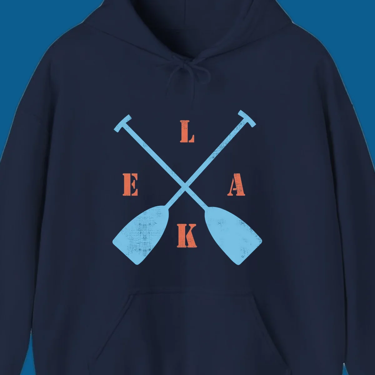 Crossed kayak paddles with letters spelling LAKE, representing lake-kayak-life.