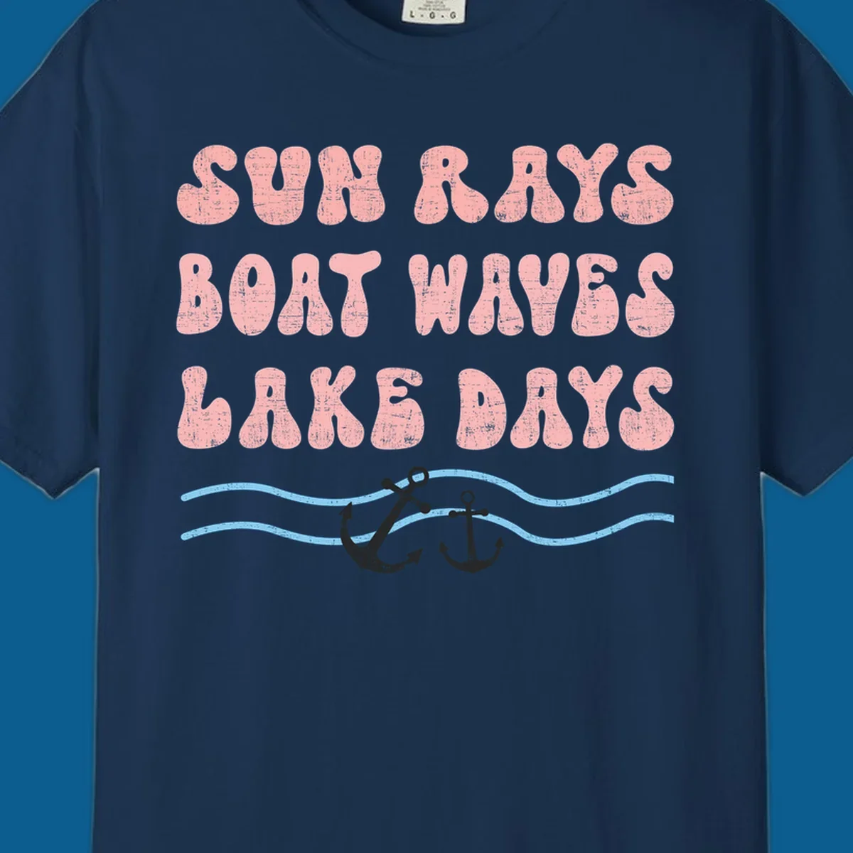 Lake days boat waves sun rays text with anchors and waves.