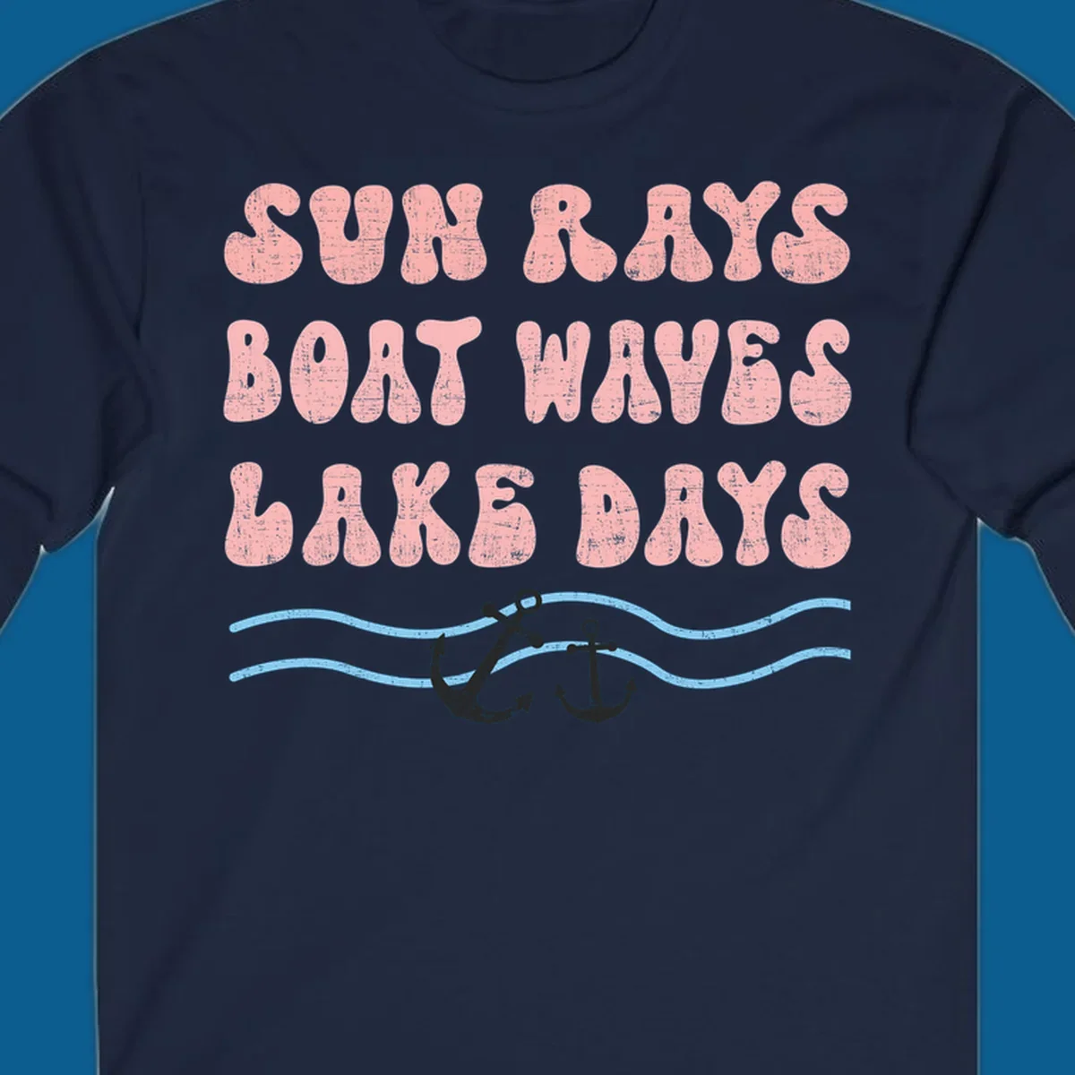 Lake days boat waves sun rays text with anchors and waves.