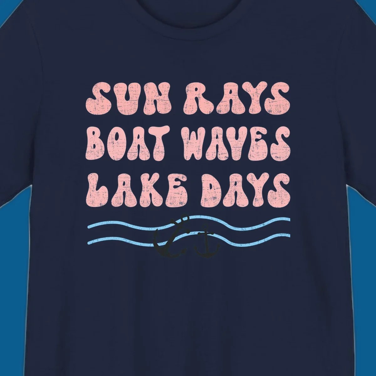 Lake days boat waves sun rays text with anchors and waves.