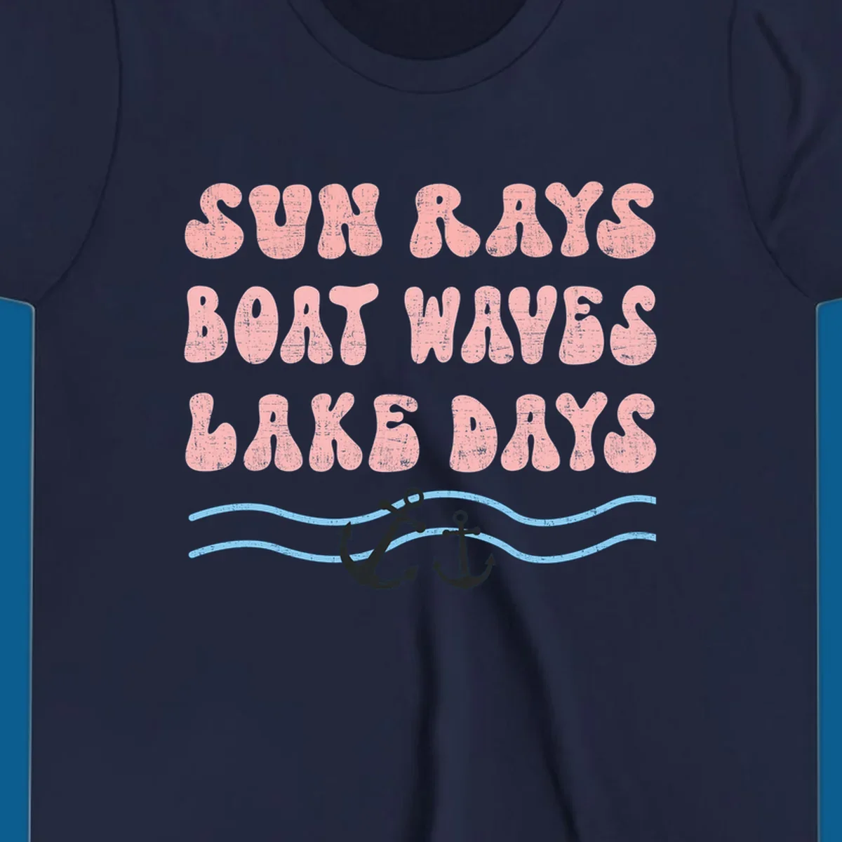 Lake days boat waves sun rays text with anchors and waves.