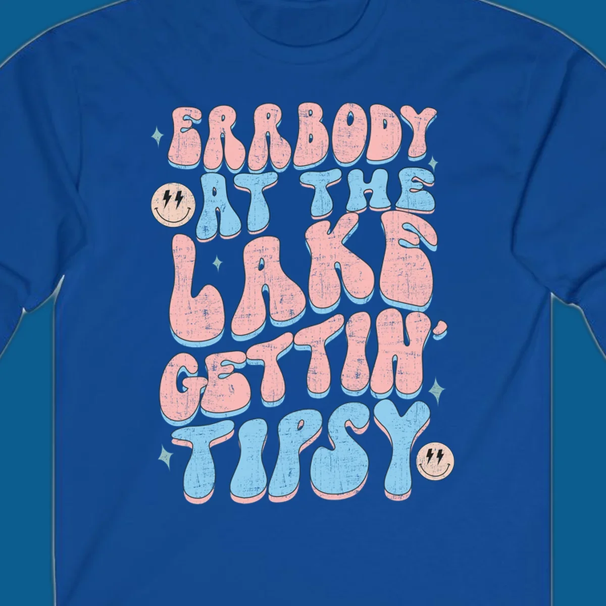 Everybody Gettin Tipsy At The Lake retro text design with smiley faces and sparkles.