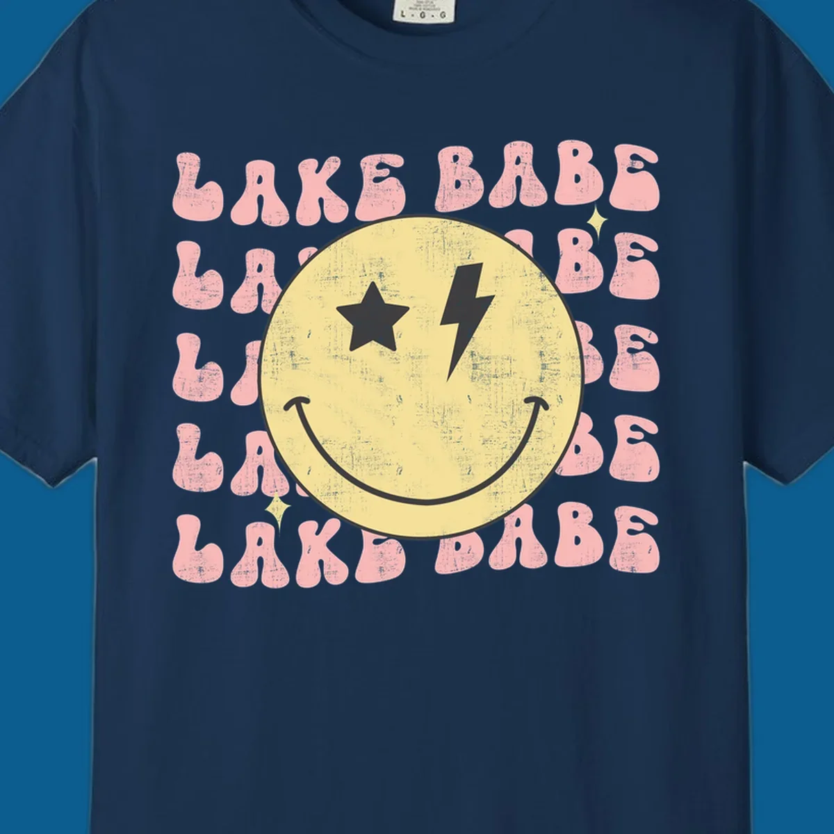 Retro lake babe smiley face graphic with groovy text.