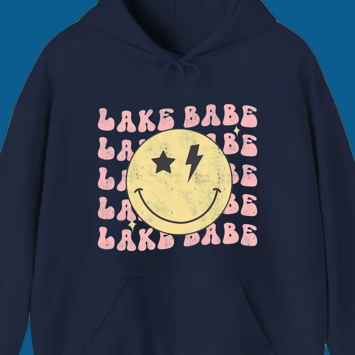 Retro lake babe smiley face graphic with groovy text.