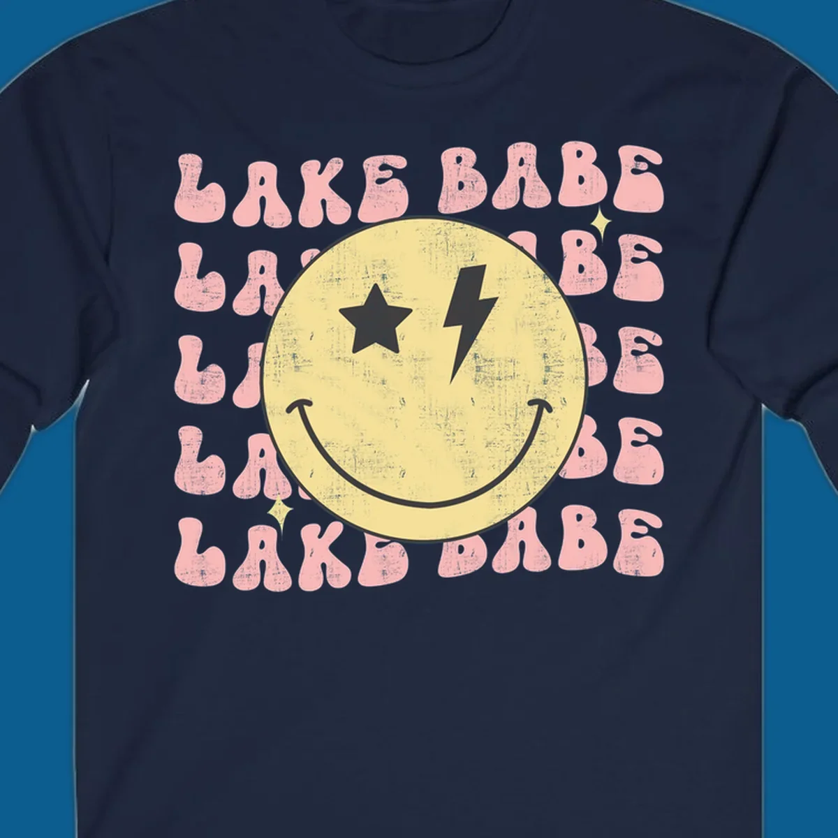 Retro lake babe smiley face graphic with groovy text.