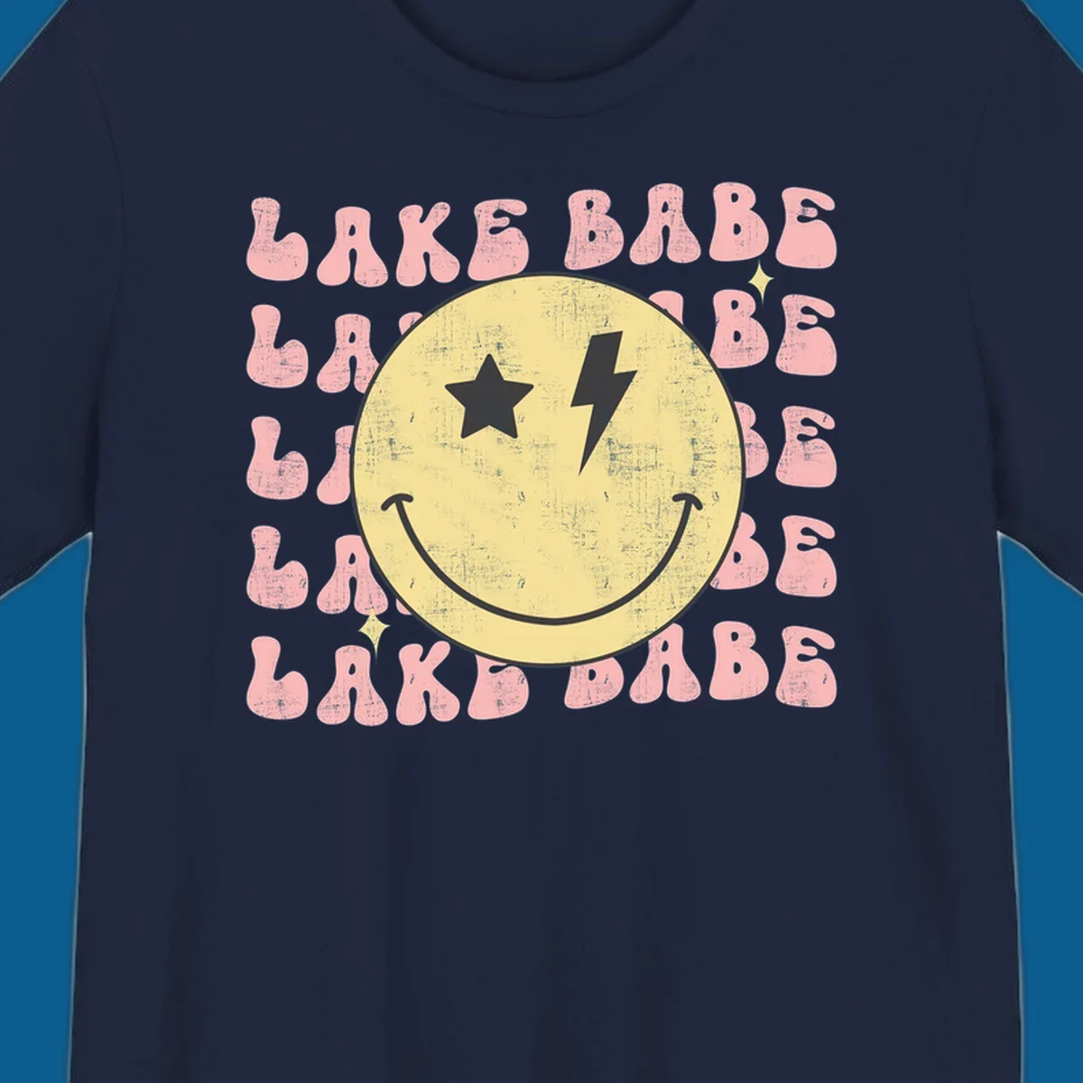 Retro lake babe smiley face graphic with groovy text.