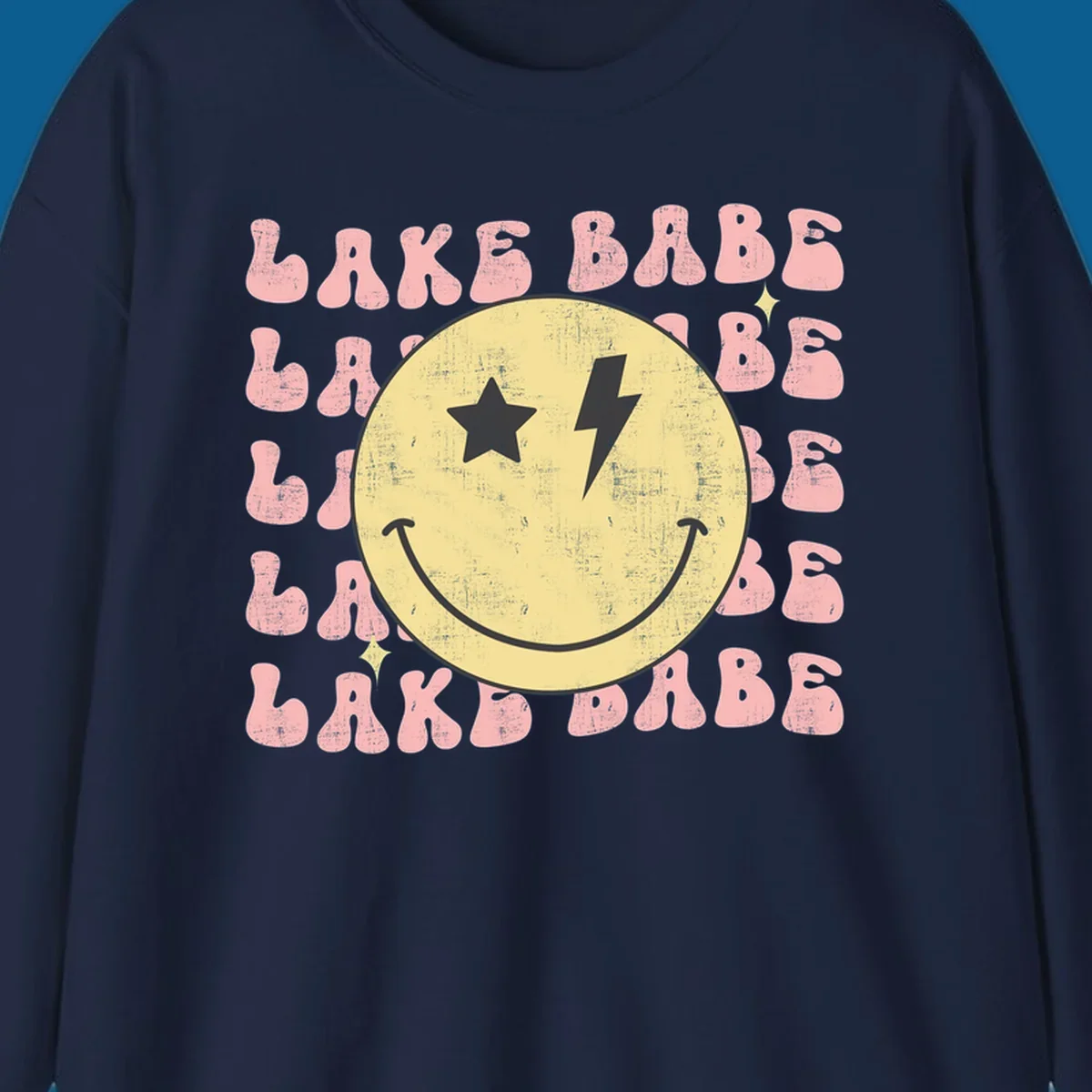 Retro lake babe smiley face graphic with groovy text.