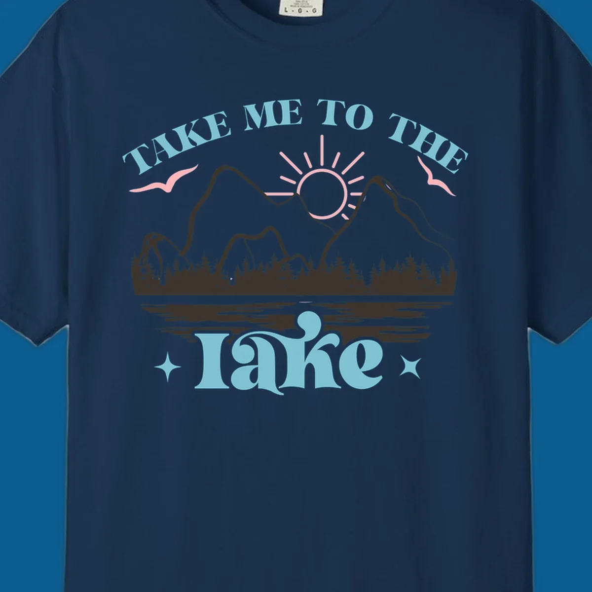 Illustration of mountains, lake, sun, and birds with text 'Take Me To The Lake'.