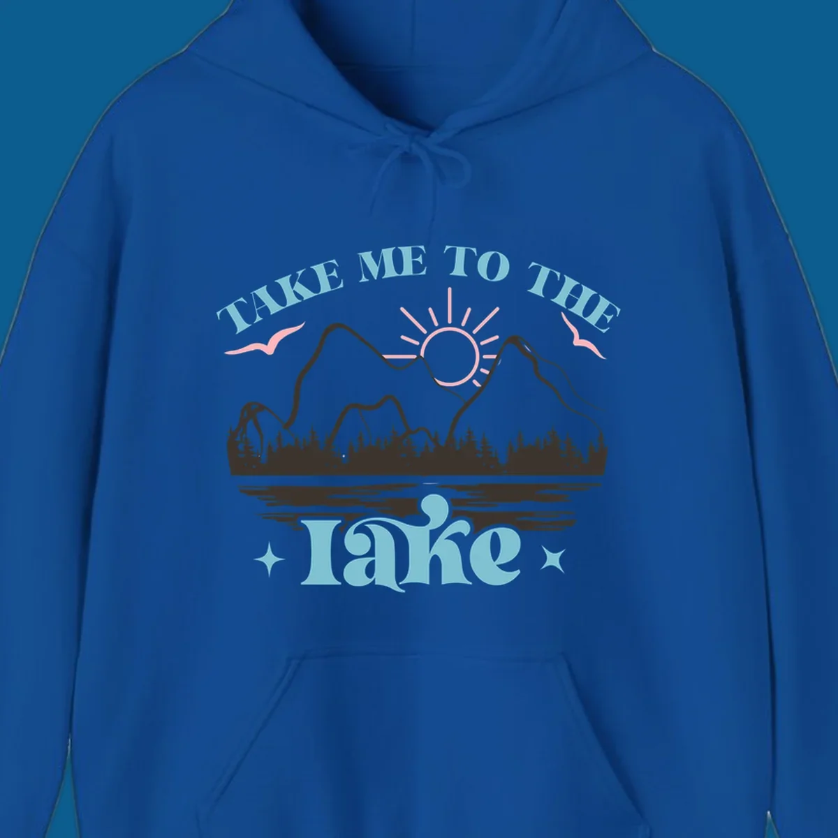 Illustration of mountains, lake, sun, and birds with text 'Take Me To The Lake'.