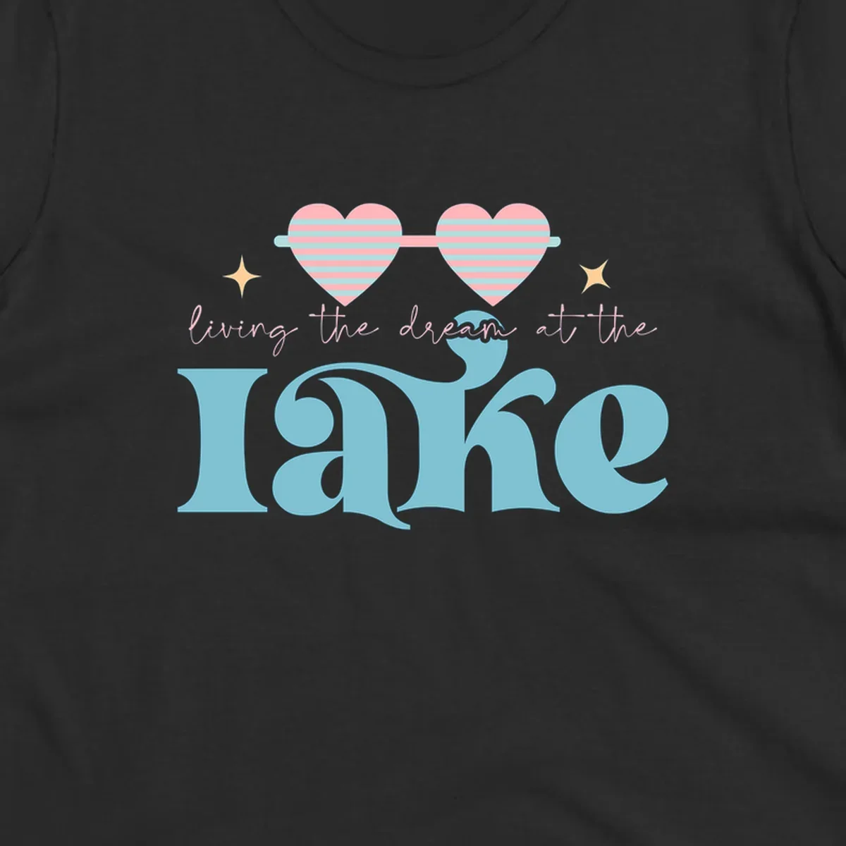 Living the dream lake life design with heart sunglasses and retro lettering.