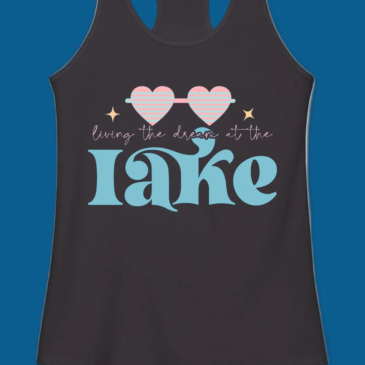 Living the dream lake life design with heart sunglasses and retro lettering.