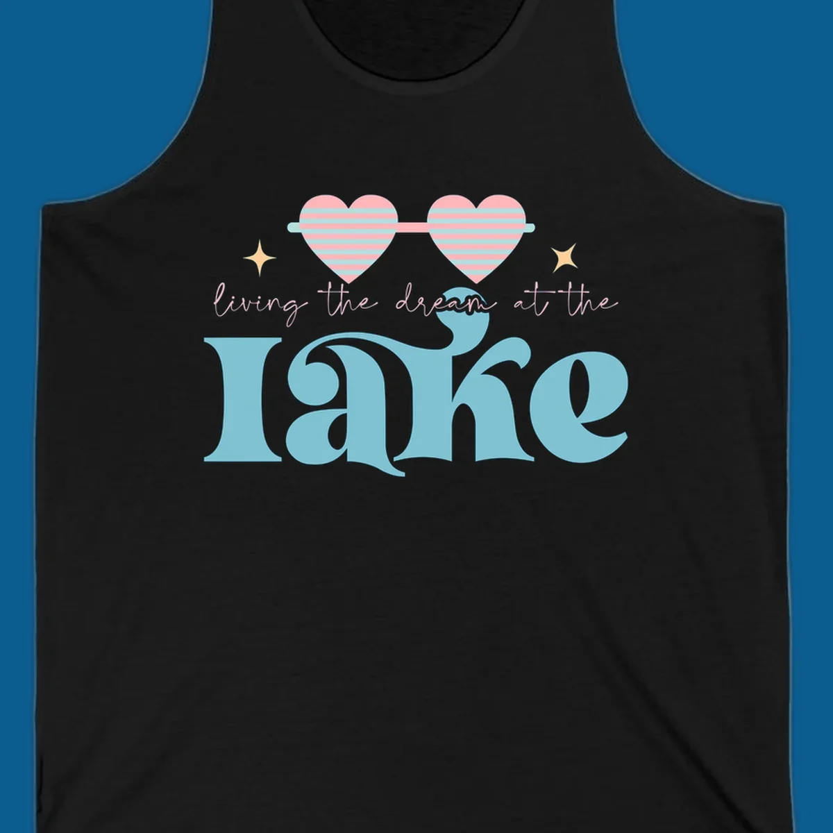 Living the dream lake life design with heart sunglasses and retro lettering.