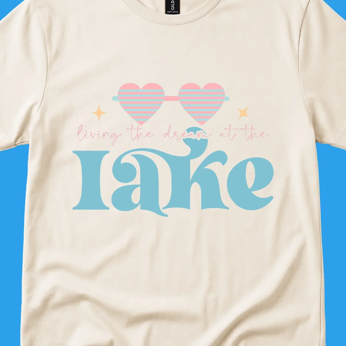 Living the dream lake life design with heart sunglasses and retro lettering.