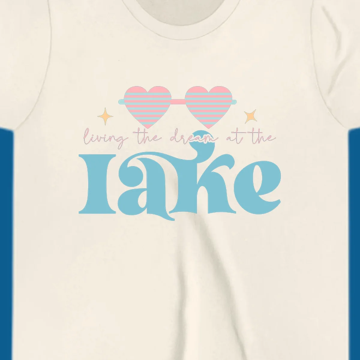 Living the dream lake life design with heart sunglasses and retro lettering.