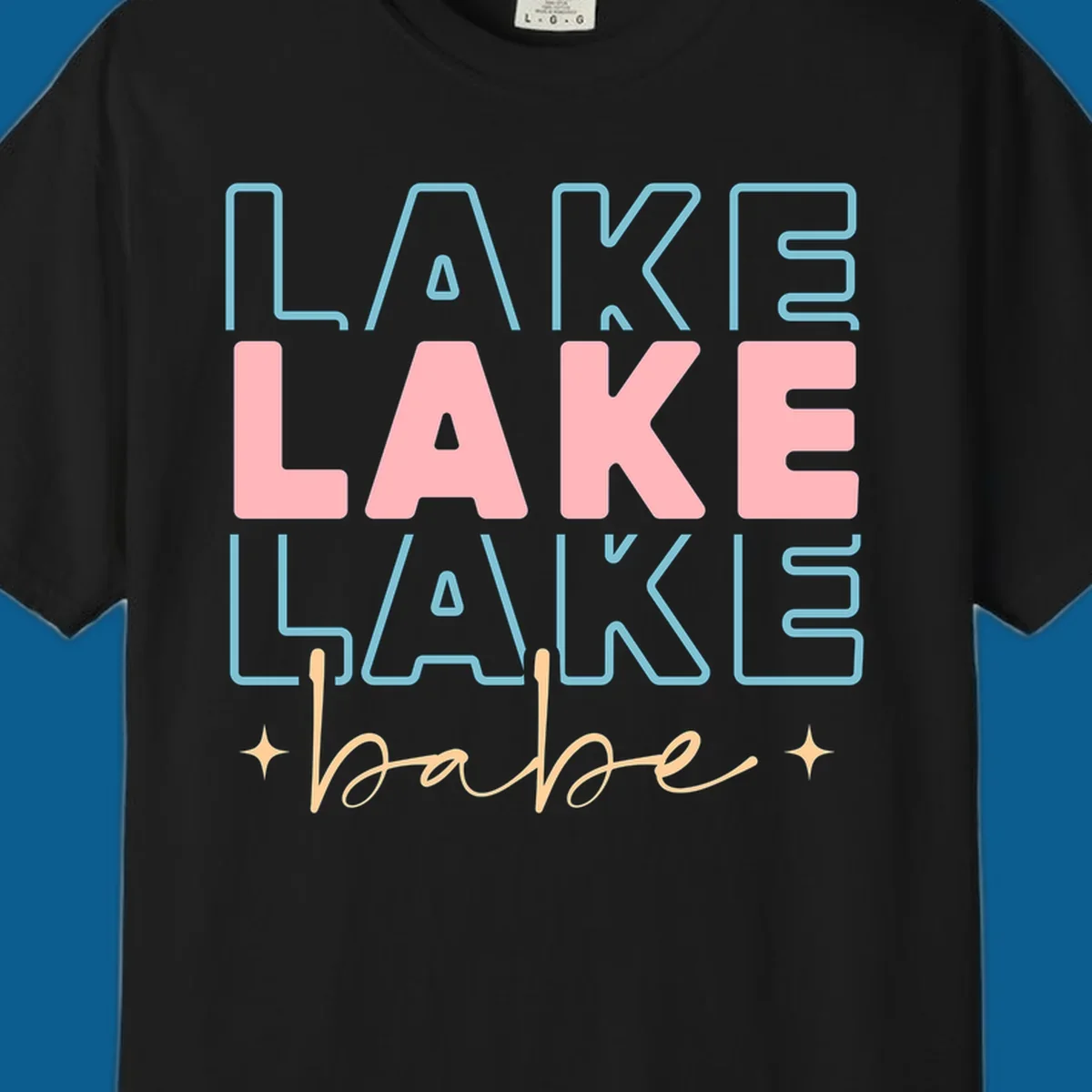 Retro typography design featuring the words LAKE LAKE LAKE and babe, with gold starburst accents.
