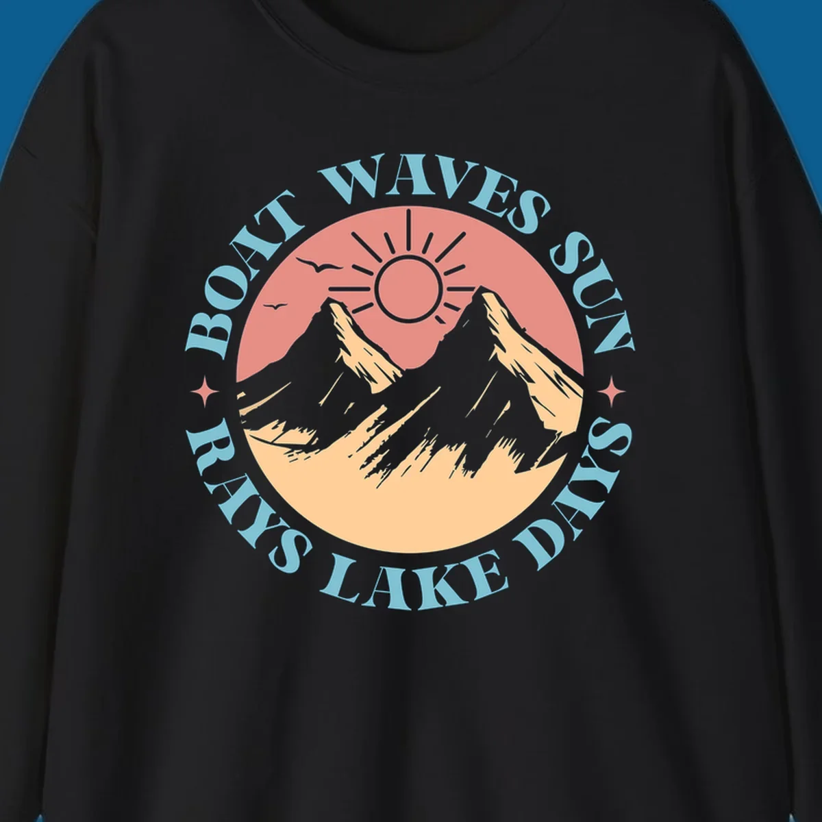 Lake days sun rays boat waves circular graphic with mountains and sun.